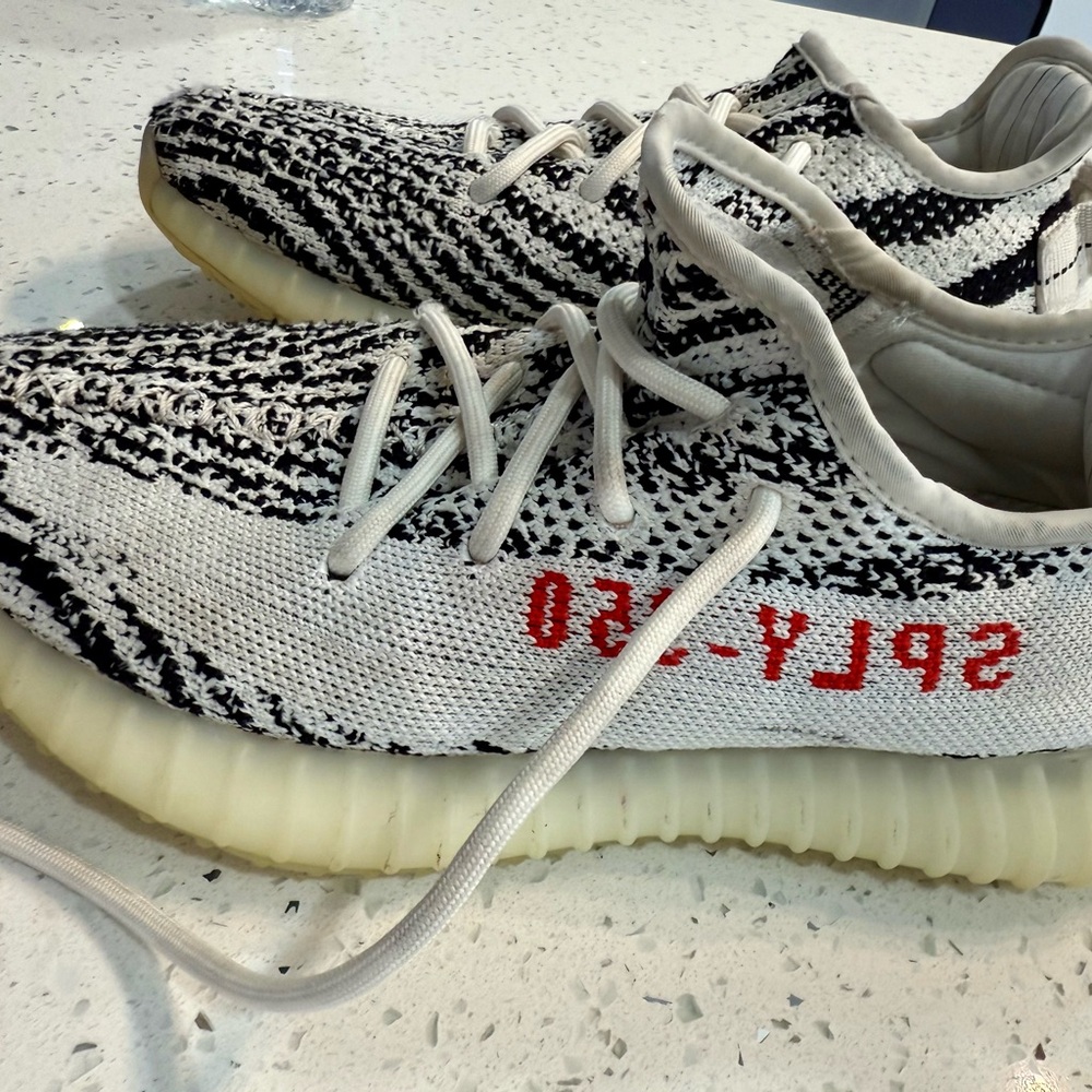 Yeezy Kids Black and Cream Sneakers